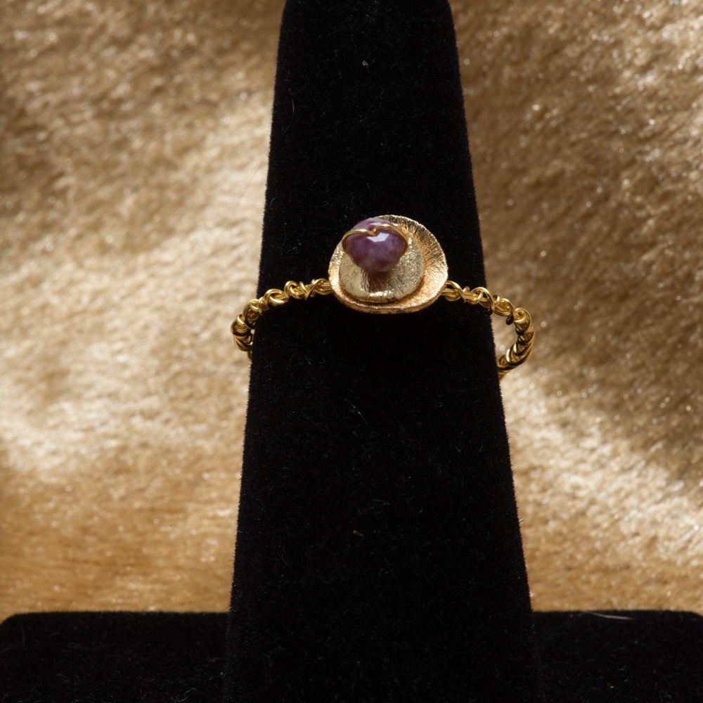 Hammered discs and gold metal wrapped ring with a pink tourmaline stone.